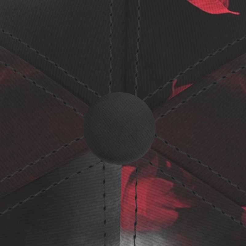 Top of a baseball cap with the  red petal smoke design on