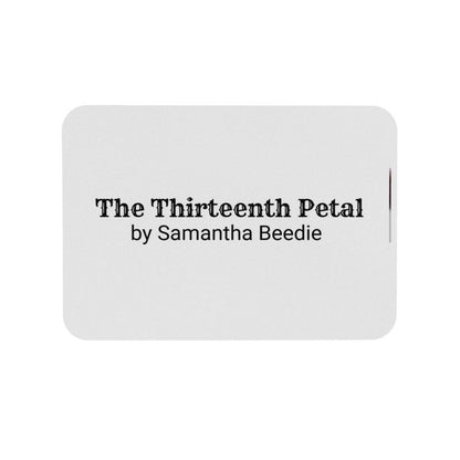 The label for the clothing brand The Thirteenth Petal 