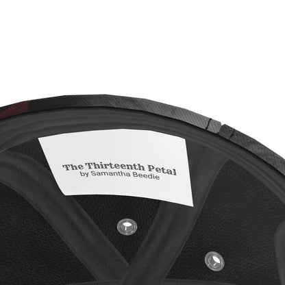 The thirteenth petal clothing brand label 